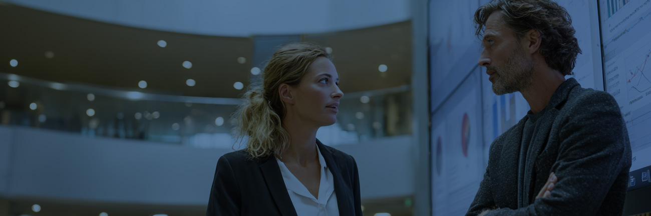 Men and women standing at office